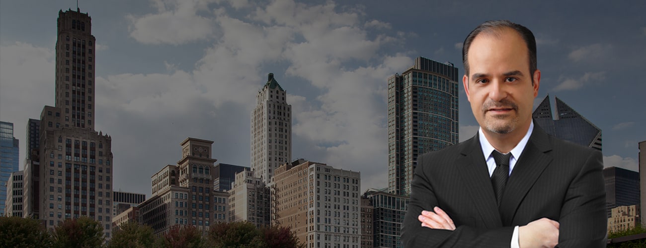 Hero Banner - Attorney Profile Picture over a skyline of Schaumburg Il